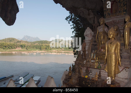 Buddhas in Pak Ou caves, Mekong River near Luang Prabang, Laos, Indochina, Southeast Asia, Asia Stock Photo