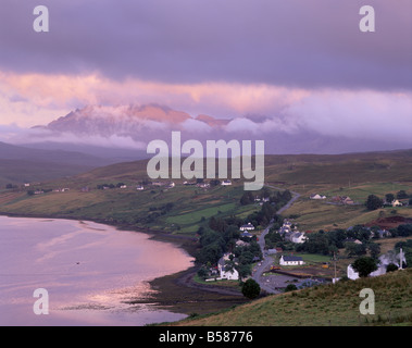 Croftship of Carbost, Loch Harport and the Black Cuillins range in cloud at sunset, Isle of Skye, Inner Hebrides, Scotland Stock Photo