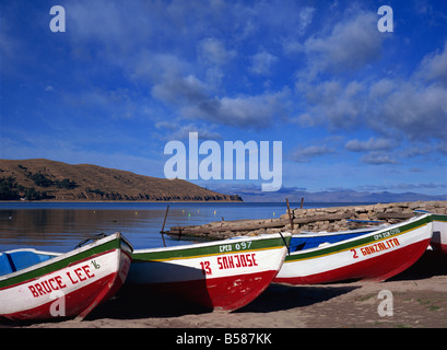 Three fishing boats pulled onto shore of Lake Titicaca, Copacabana, Bolivia, South America Stock Photo