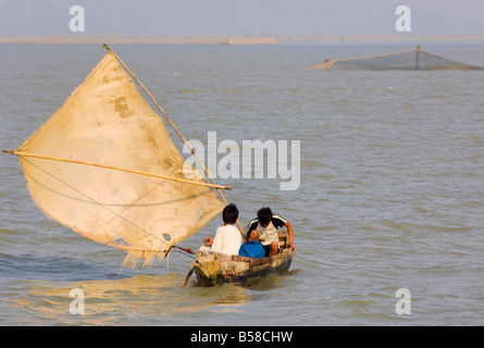 Boat on the Kaladan River, Myanmar (Burma) Stock Photo