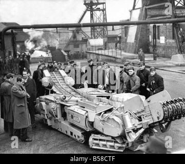 This 15 ton continous miner has been imported from the United States for experiments in British mines It is claimed that under American mining conditions it can move two tons of coal a minute It is capable of cutting and loading coal and moving forward in one operation This moded first of its kind to leave the United States was demonstrated on the surface at Donisthorpe Colliery Leicestershire It cannot be put below ground until the pit ha stopped working for the Christmas holiday Stock Photo