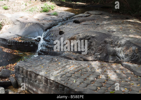 Siem Reap, Cambodia Kbal Spean This Cambodian riverbed is covered in ...