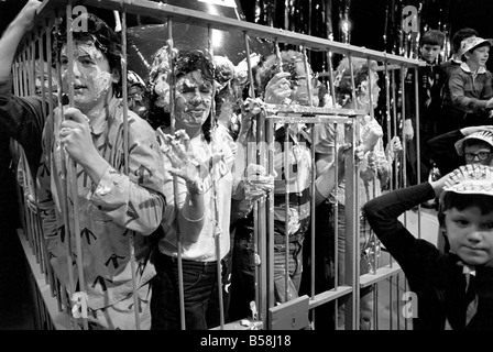 Entertainment: Television programme: Tiswas: Daily Mirror's Sue Tranter, spent the Saturday morning in the cage on the Tiswas programme in Birmingham being pelted with foam 'Custard' pies and drenched with cold water. January 1981 81-00026-010 Stock Photo