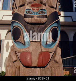 Close up of painted carving on a totem pole in Thunderbird Park Victoria British Columbia Canada North America Stock Photo