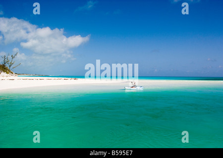 Crystal waters in the Bahamas Land Sea Park with kayak paddler Stock Photo