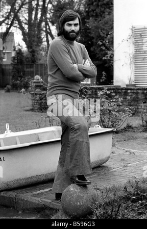 George Best. Footballer George Best at the Bray home of Michael 'Parkinson,' who has written a book on George. March 1975 Stock Photo