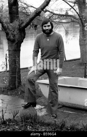 George Best. Footballer George Best at the Bray home of Michael 'Parkinson,' who has written a book on George. March 1975 Stock Photo