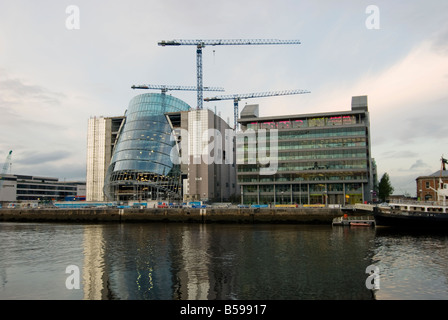 National Conference Center Under Construction and the PWC building on North Wall Quay Dublin Ireland Stock Photo
