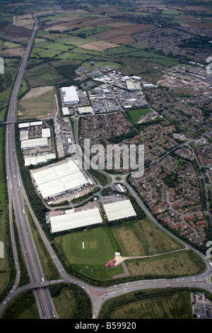 Aerial view south of M40 Motorway Junction 11 Hennef Way A422 Banbury Twenty Cricket Club Trading Estates suburban houses Oxford Stock Photo