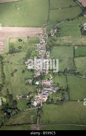 Aerial view north east of Brooksby Village Main Street Gaddesby Lane country fields Leicestershire England UK High level oblique Stock Photo