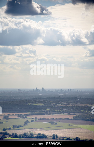 Aerial view south west of country fields Romford Epping Forest Essex clouds The City of London skyline RM4 EC2 EC3 England UK Stock Photo