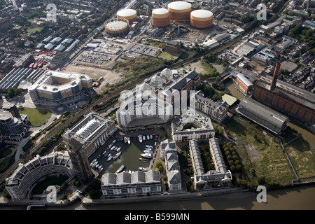 Aerial view north west of Chelsea Harbour Marina Chelsea Creek gas works Sands End suburban houses apartment blocks London SW6 S Stock Photo