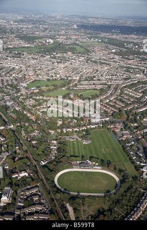 Aerial view north east of Herne Hill Velodrome sports grounds railway line suburban houses Dulwich Village London SE21 SE22 UK Stock Photo