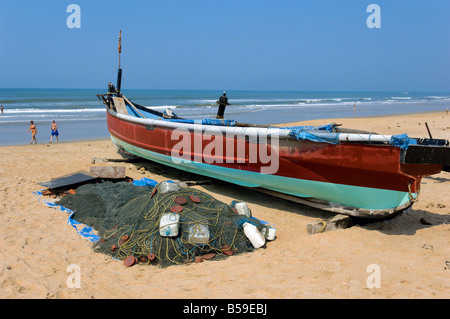 Fishing boats at Benaulim Beach South Goa, India. Stock Photo