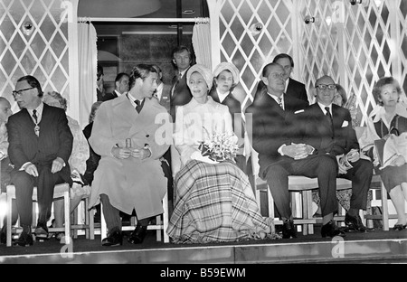 Her Majesty Queen Elizabeth II, Prince Phillip, Duke of Edinburgh and Prince Charles pictured on the terrace of County Hall as the River Pageant passed by during this evening's rain. The pageant is part of the Silver Jubilee celebrations;June 1977 ;R77-3277 Stock Photo