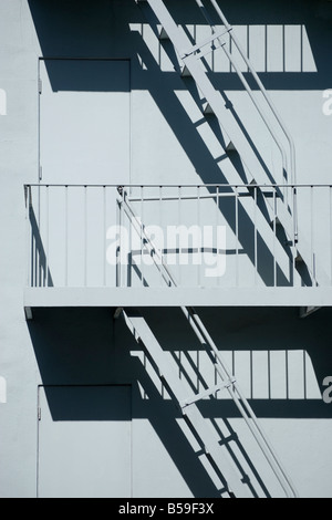 Fire ladder on the outside of a building Stock Photo