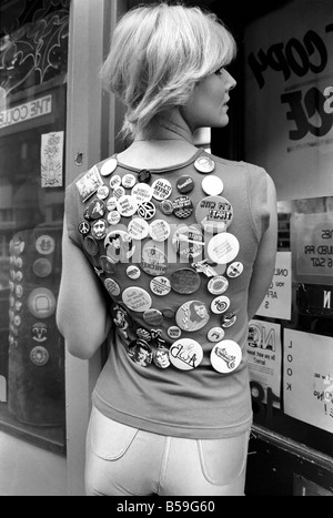People: Woman: Janine Andrews model, with badges from the Badge Shop in