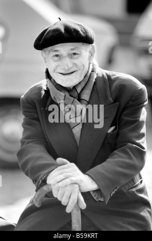 An old man of Paris wearing beret, scarf and coat on a coald day in France&#13;&#10;April 1975 &#13;&#10;75-2099-007 Stock Photo