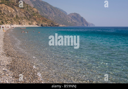 The pebble beach and emerald seas at Sougia on the south coast of Crete Greek Islands Greece Europe Stock Photo