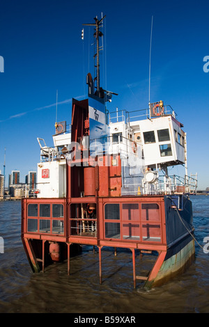 The Slice of Reality Sculpture by Richard Wilson, moored on the River Thames, North Greenwich, London, UK 2008 Stock Photo