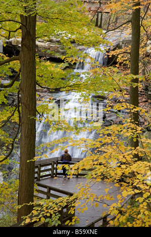 Boston Ohio A visitor at Brandywine Falls in Cuyahoga Valley National Park Stock Photo