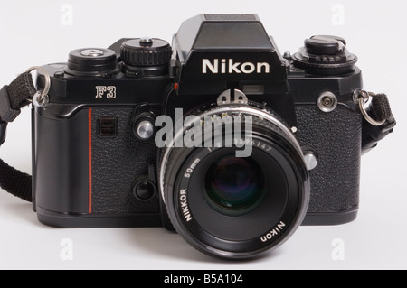 A Professional Nikon F3  35mm film camera in black with Nikon 50mm f2 ai Nikkor standard manual focus lens attatched Stock Photo