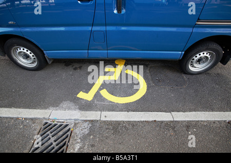 disabled handicap handicapped wheelchair access parking space special needs sign Stock Photo