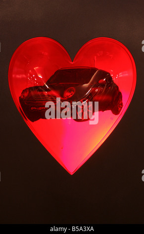 A heart with a Mini Cooper inside Stock Photo