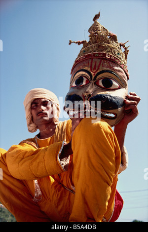 Actor with mask worn in the Ramlilla the stage play of the Hindu epic the Ramayana Varanasi Uttar Pradesh state India Asia Stock Photo