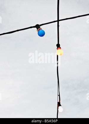 Colorful Light Bulbs Against Sky Stock Photo