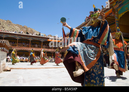 Close up of a monk dancing in full traditional costume in monastery courtyard, Hemis Festival, Hemis, Ladakh, India Stock Photo