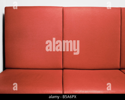 Red Leather Couch Close up Stock Photo
