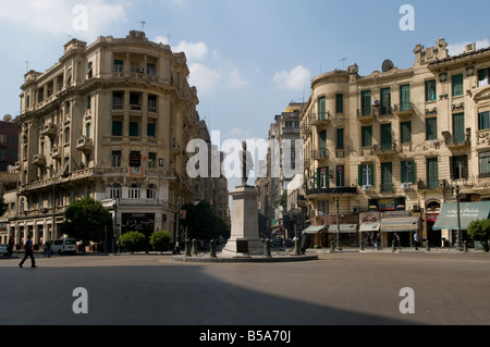 Statue of Talaat Harb who was a leading Egyptian economist and founder of Banque Misr located in Midan Talaat Harb Square Downtown Cairo Egypt Stock Photo