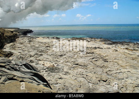Newly built bench is now inactive Waikupanaha ocean entry lava flow area Stock Photo