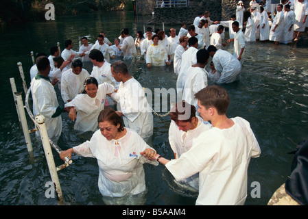 Ceremony of mass baptism into Christianity in the Sea of Galilee at Yardent, Israel, Middle East Stock Photo