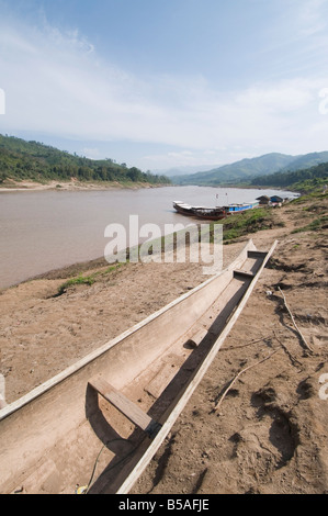 On side of Mekong River at Gom Dturn, a Lao Luong Village in the Golden Triangle area of Laos, Indochina, Southeast Asia Stock Photo