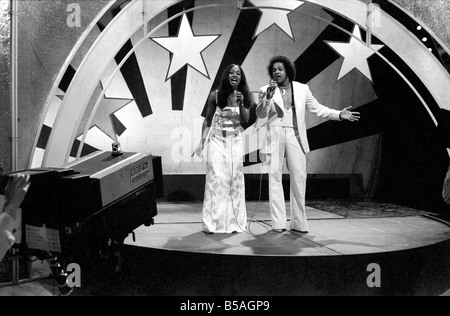 Filming of the television music chart show Top of the Pops at the BBC Studios. ;Mac and Katie Kissoon, brother and sister singing team. April 1975 ;75-2128-010 Stock Photo