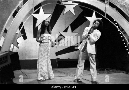 Filming of the television music chart show Top of the Pops at the BBC Studios. ;Mac and Katie Kissoon, brother and sister singing team. April 1975 ;75-2128 Stock Photo