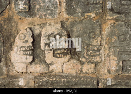 Carvings of skulls on the Tzompantli, Chichen Itza, UNESCO World Heritage Site, Yucatan, Mexico, North America Stock Photo