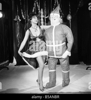 Model Kim Tracy seen here dressed for the office Christmas Party. 1960 E479-007 Stock Photo