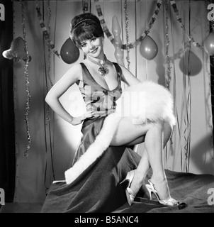 Model Kim Tracy seen here dressed for the office Christmas Party. 1960 E479-011 Stock Photo