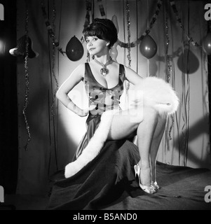 Model Kim Tracy seen here dressed for the office Christmas Party. 1960 E479-020 Stock Photo