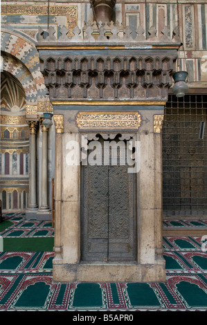 Decorated Minbar or mimbar inside the prayer hall of Mosque Madrassa of Sultan Hassan located in Cairo Egypt Stock Photo