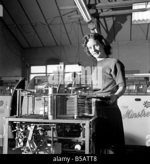 Kathleen Craig juke box queen who selects records for jukeboxes. 1956 A516-008 Stock Photo