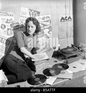 Kathleen Craig juke box queen who selects records for jukeboxes. 1956 A516-011 Stock Photo