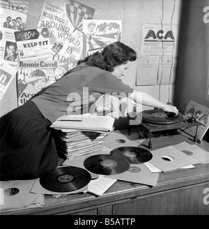 Kathleen Craig juke box queen who selects records for jukeboxes. 1956 A516-013 Stock Photo