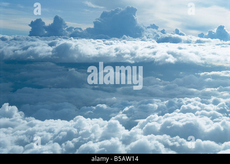 Aerial of banks of puffy white clouds seen from the air Stock Photo