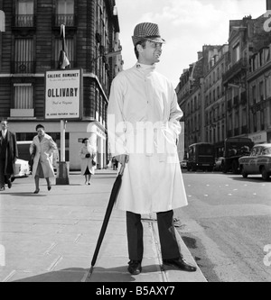 Men modelling the latest 1963 menswear design's in the streets of Paris