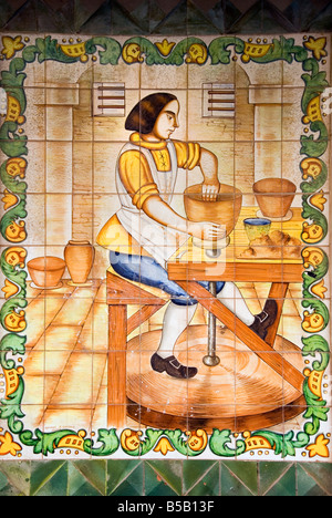 Detail of old shop sign of hand painted tiles or Azulejos in the historical city centre of Valencia Spain Stock Photo