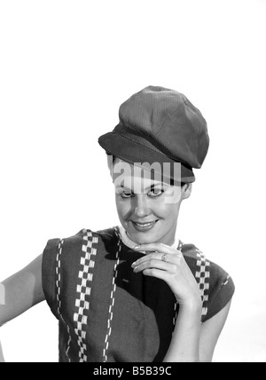 Model Jackie White wearing red coduroy hat.  Circa 1963 Stock Photo